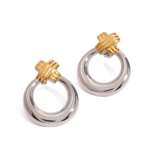 Two-tone gold and silver crossover hoop earrings in minimalist stainless steel design