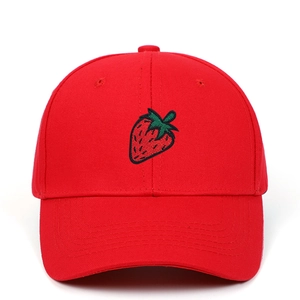 Detailed embroidery of a vibrant red strawberry on a high-quality cotton baseball cap