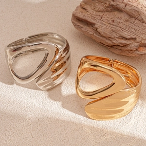 Minimalist asymmetric hollow geometric open cuff bracelets in gold and silver finishes