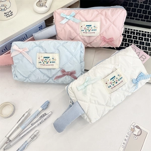 Quilted nylon organizer bags in pink blue white colors with cute bow and happy label