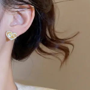 Exquisite gold-plated heart stud earrings with yellow zircon crystals for women