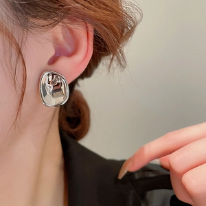 Minimalist irregular geometric silver stud earrings with liquid metal texture for women