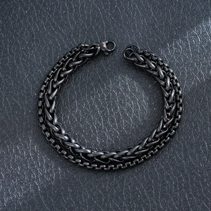 Close-up of black stainless steel wheat and box chain bracelet with lobster clasp