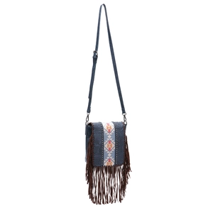 Detail of dark blue bohemian crossbody bag with ethnic embroidery and brown leather tassels