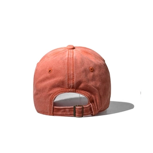 Detail view of washed vintage baseball cap showing the adjustable metal bronze buckle