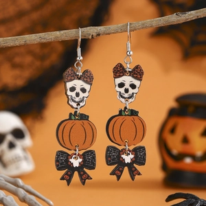 Halloween drop earrings with skull pumpkin and spider web bow on wooden branch