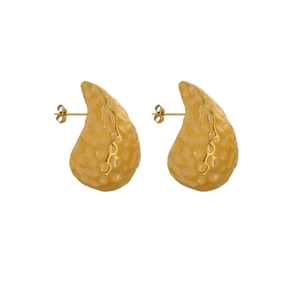 Elegant gold teardrop earrings with hammered metal texture on white background