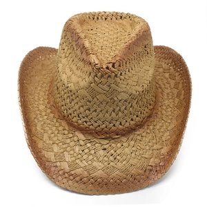 Detail of western straw hat featuring hollow weave pattern and curved brim for sun protection