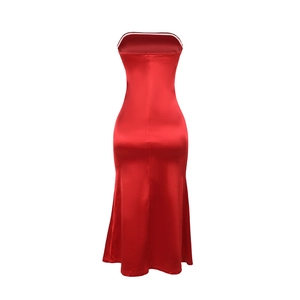 Detail of red satin mermaid dress with elegant strapless neckline and smooth texture