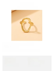 Detail of baroque gold stainless steel hollow oval ring showing its 21mm width and size