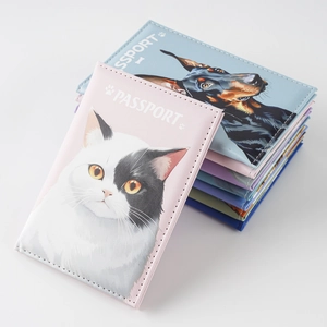 Detail view of colorful UV printed PU leather passport holders with cat and dog illustrations