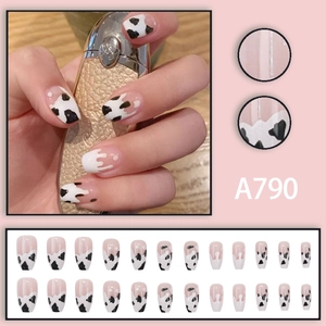 French tip cow print coffin press-on nails with 24 pieces in a full manicure kit