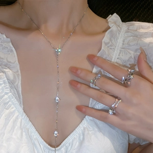 Silver body chain necklace and rings set with sparkling zircon tassels for women