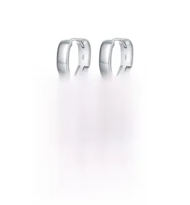 Macro shot of minimalist s925 sterling silver square hoop earrings with mirror finish