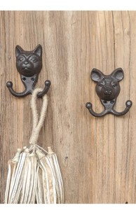 Detail von Vintage-Wandhaken aus Gusseisen mit Tierkopf-Designs von Katze und Schwein