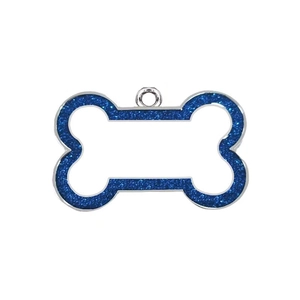 Close-up of bone-shaped pet tag with blue glitter finish and silver metal edges