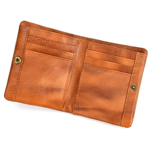 Internal layout of brown leather bifold wallet showing multiple card slots and snap button