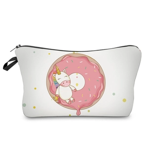 Detail view of white cosmetic bag with cute cartoon unicorn and pink donut print