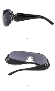 Detail view of Y2K rimless sunglasses with rhinestone side and back temple embellishments