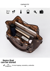 Interior capacity detail of checkered bucket bag holding a 14-inch laptop and A4 magazine