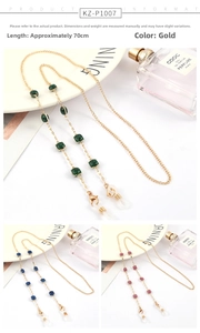 Detail of 70cm gold eyewear chain featuring green, blue, and pink geometric crystals