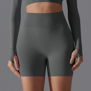 Detail of high-waist seamless yoga shorts with ribbed waistband for tummy control