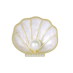 Elegant French vintage shell brooch with white pearl and gold accents on white background