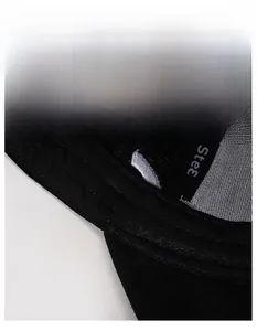 Detailed close-up of the breathable cotton inner sweatband on a black baseball cap