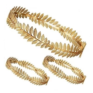 Detailed view of the golden leaf crown headpiece with matching leaf bracelets set