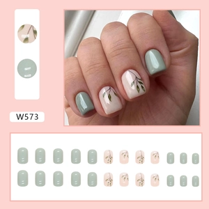 Short square press-on nails with sage green gradient and delicate leaf hand-painted designs