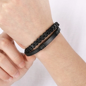 Men's double-layer black braided leather bracelet featuring a matte black metal plate