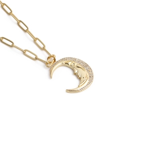 Golden 3D crescent moon pendant necklace with pavé stones and paperclip chain