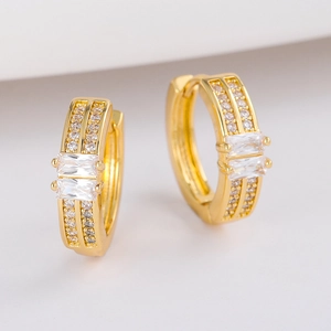 Golden oval hoop earrings with double rectangular crystals and white zircon accents