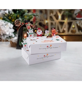 Close-up of cute cartoon Christmas folding gift boxes with reindeer and Santa illustrations
