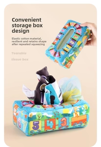 Detail of soft plush sensory tissue box toy showing elastic cotton filling resilience