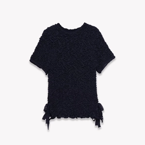 Short sleeve textured navy knit top with round neck and side bow ties at the hem