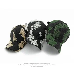 Ethnic jacquard baseball caps with lace texture in white, cream, and green colors