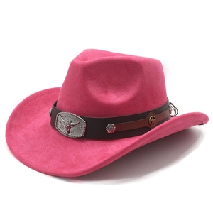 Detail of bright pink suede western cowboy hat with silver bull head buckle and leather band