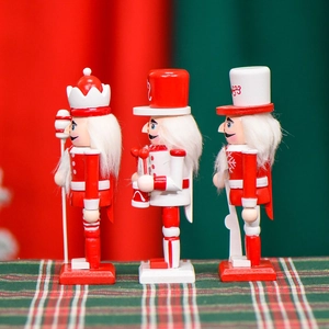 Ensemble de trois soldats casse-noisettes en bois rouge et blanc pour décoration de Noël