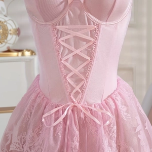 Pale pink lace babydoll dress with satin ribbon lacing and floral embroidery