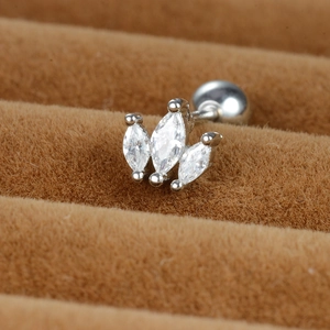 Macro shot of silver screw-back ear stud with three marquise-cut marquise-cut cubic zirconias