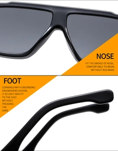 Detail of ergonomic nose pads and temples on these oversized black fashion sunglasses