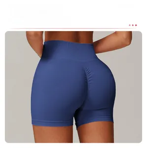 Close-up of seamless scrunch butt design on navy blue high-waisted yoga shorts