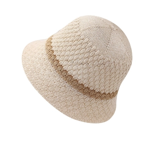 Women's foldable knit bucket hat in beige with brown stripes for sun protection