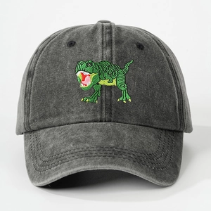 Detailed view of dark grey washed cotton baseball cap with green dinosaur embroidery