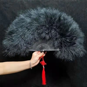 Thick black feather folding fan with red tassel for dance and stage performances
