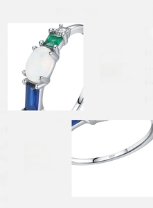Macro detail of S925 silver ring featuring oval opal and emerald-cut colorful gemstones