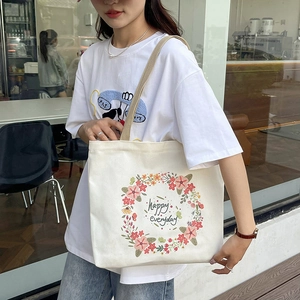 Large capacity canvas tote bag with floral print and Happy Everyday text for women