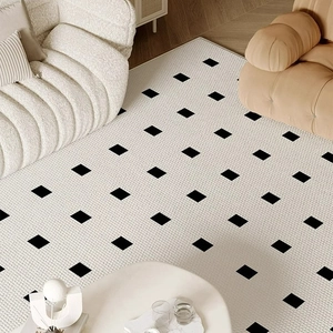 French retro style cream area rug with black square pattern for a modern living room decor