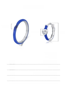 Macro detail of blue enamel heart ring and earring set in 925 sterling silver with gems